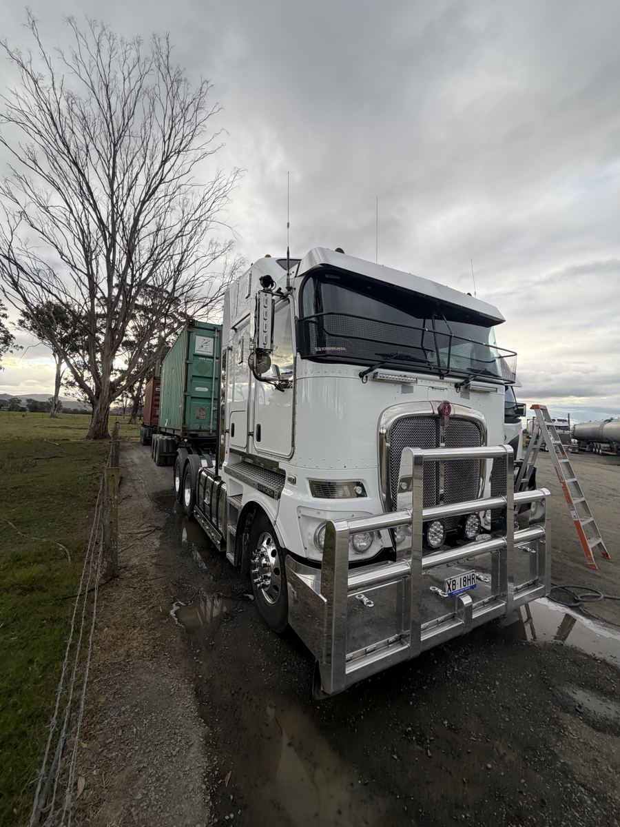 Detailed white Kenworth cab-over with grille guard
